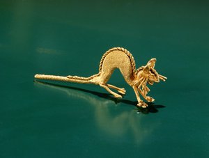 En Muisca drake (koppar)
